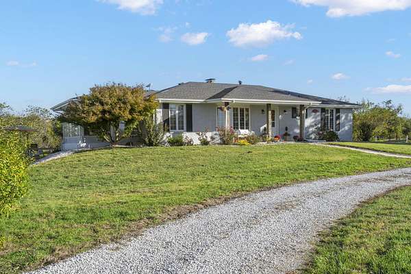 44.8 Acres of Agricultural Land with Home for Sale in Springfield, Missouri