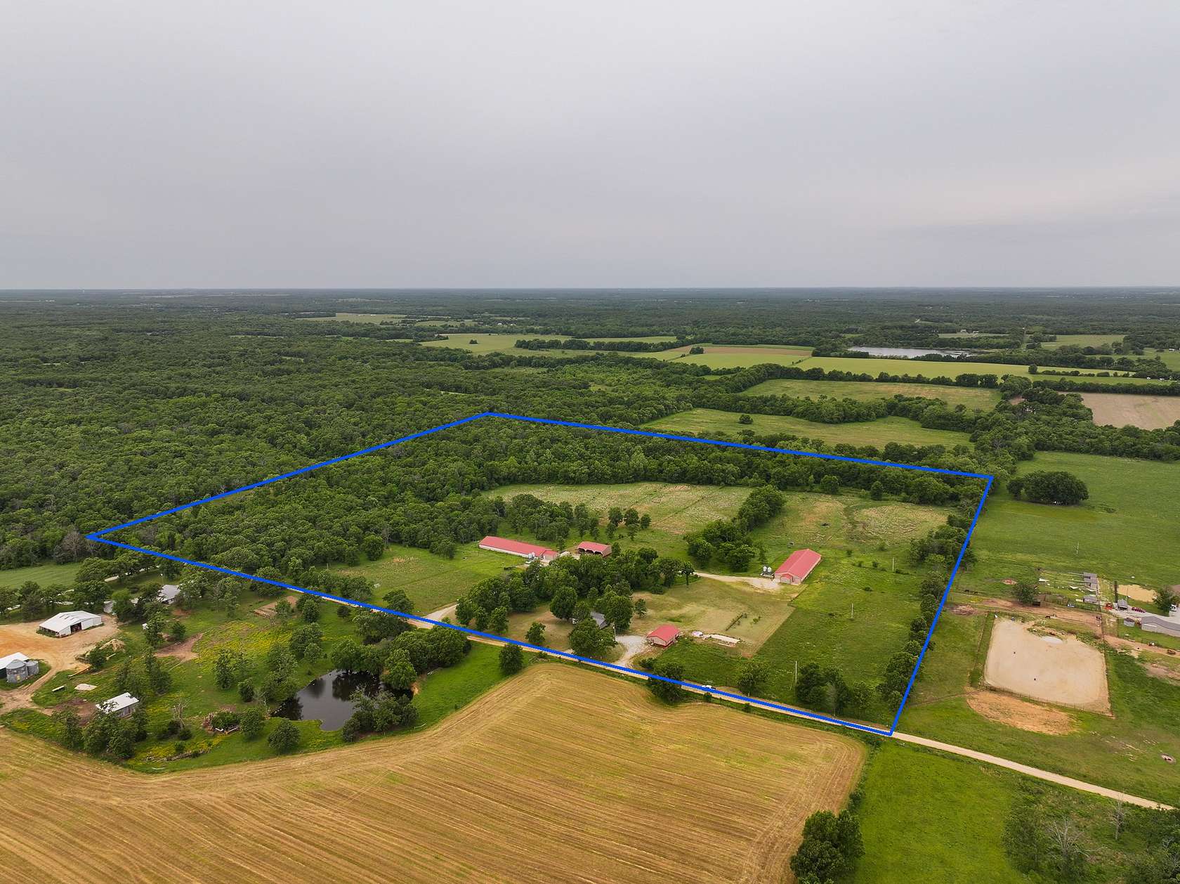 48.4 Acres of Agricultural Land with Home for Sale in El Dorado Springs, Missouri