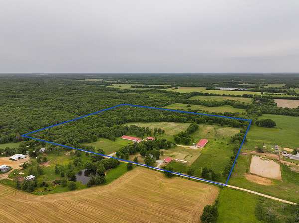 48.4 Acres of Agricultural Land with Home for Sale in El Dorado Springs, Missouri