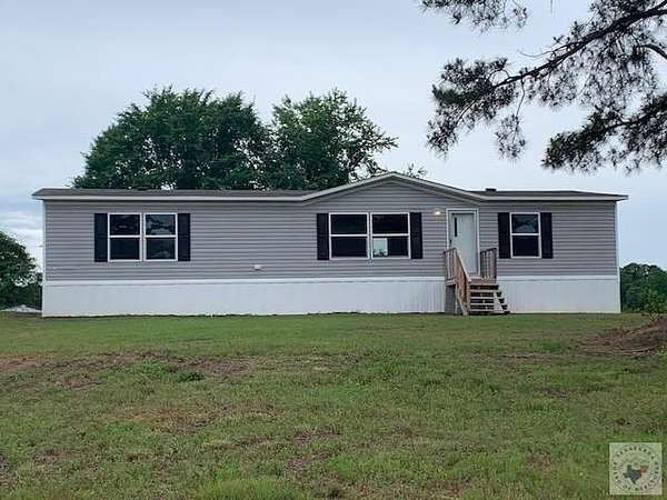 8 Acres of Land with Home for Sale in Fouke, Arkansas