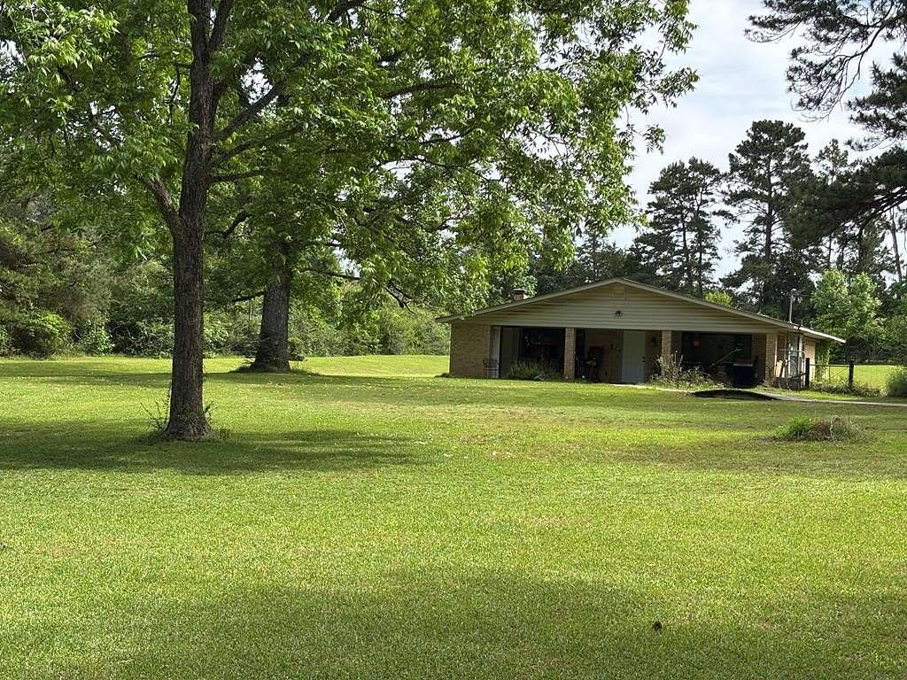 7 Acres of Land with Home for Sale in Pollok, Texas