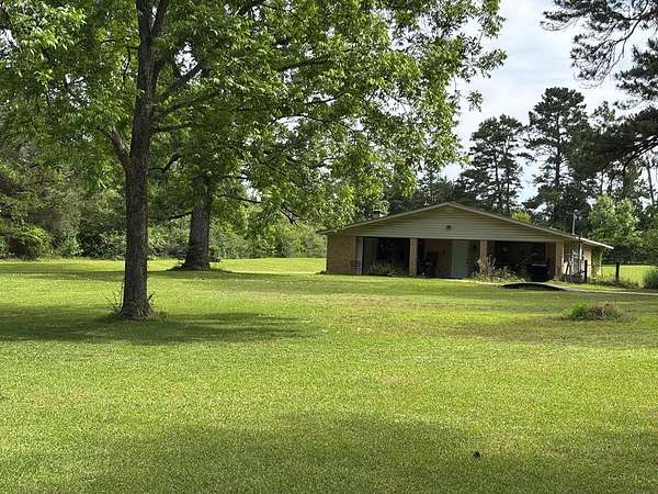 7 Acres of Land with Home for Sale in Pollok, Texas