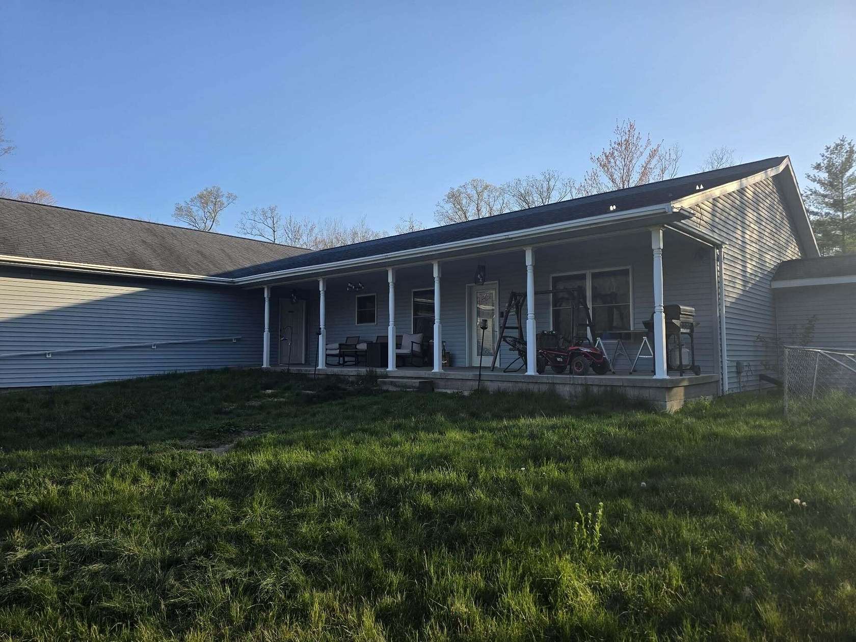10 Acres of Land with Home for Sale in Grant, Michigan