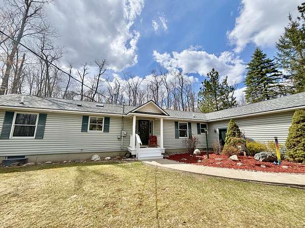 2.15 Acres of Land with Home for Sale in Lewiston, Michigan