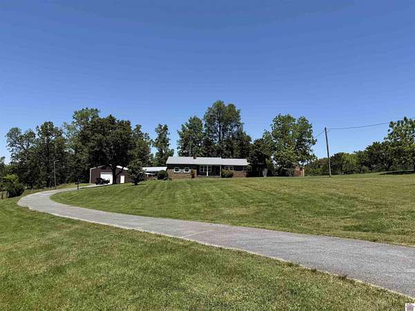 7.48 Acres of Land with Home for Sale in Mayfield, Kentucky