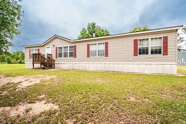 1.5 Acres of Land with Home for Sale in Hermitage, Arkansas