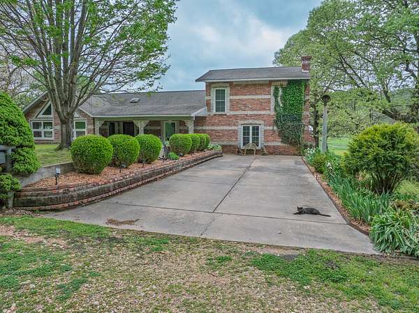 100 Acres of Agricultural Land with Home for Auction in Wyandotte, Oklahoma