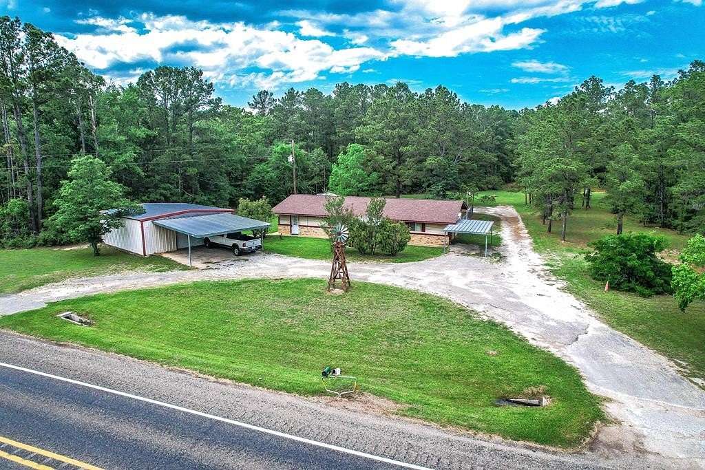 7.58 Acres of Land with Home for Sale in Zavalla, Texas