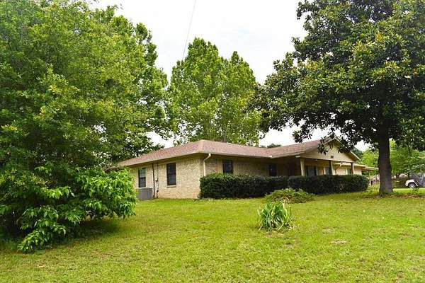 3.29 Acres of Land with Home for Sale in Palestine, Texas