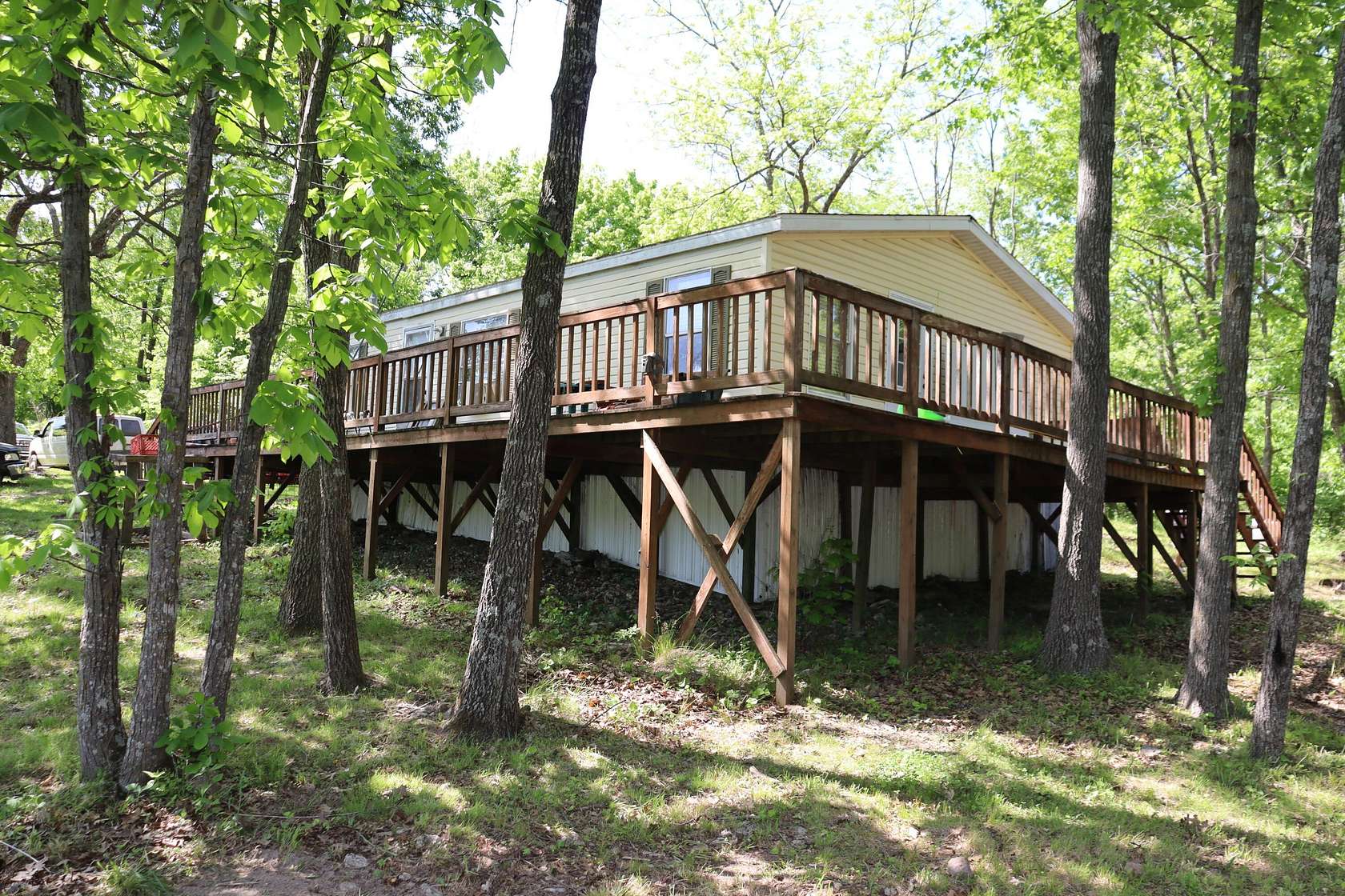 10 Acres of Land with Home for Sale in Seymour, Missouri
