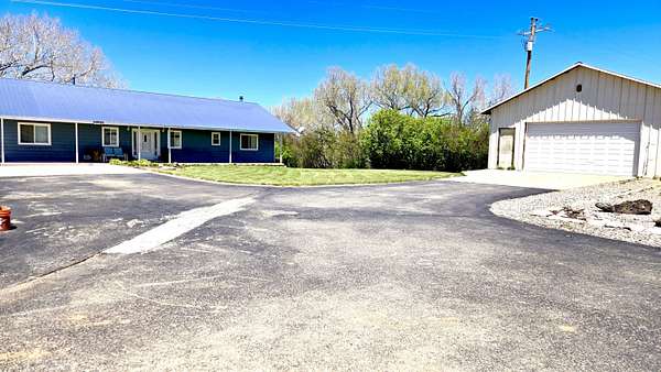 8 Acres of Land with Home for Sale in Los Ojos, New Mexico