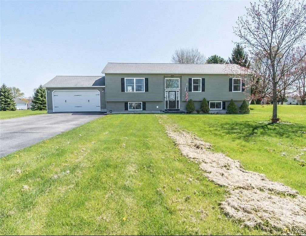 1.69 Acres of Land with Home for Sale in Dexter, New York