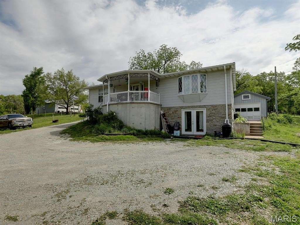 9 Acres of Land with Home for Sale in New London, Missouri