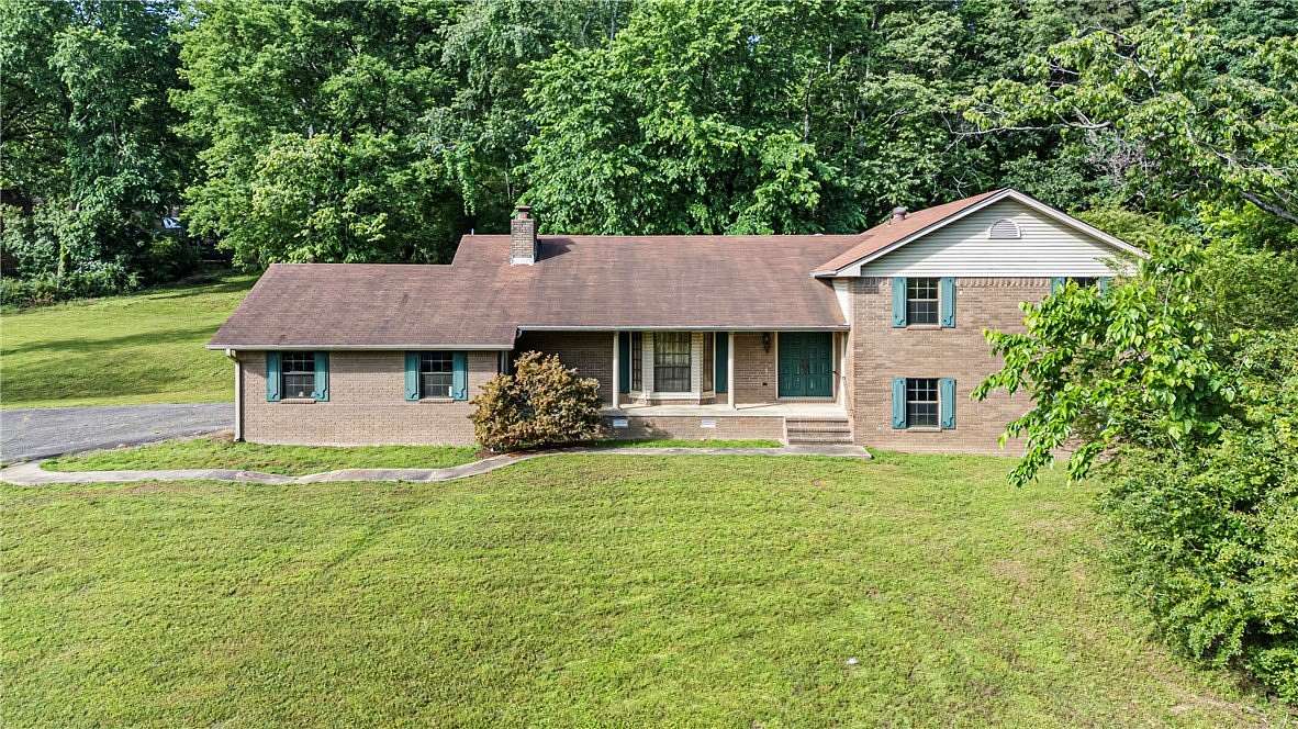 4.4 Acres of Land with Home for Sale in Russellville, Arkansas