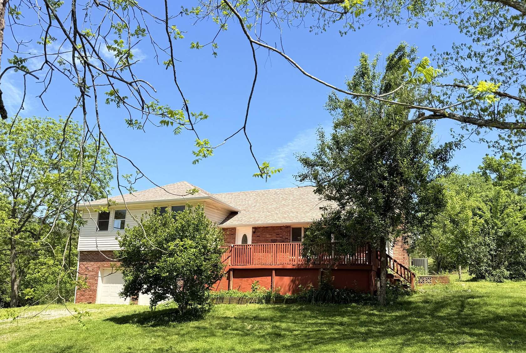 10 Acres of Land with Home for Sale in Vanzant, Missouri