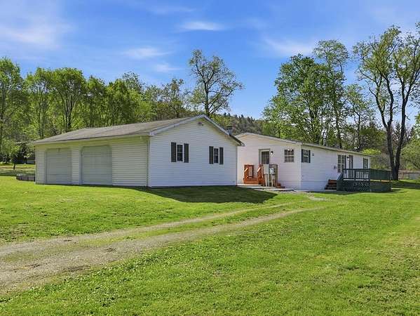 1.56 Acres of Land with Home for Sale in Nichols, New York