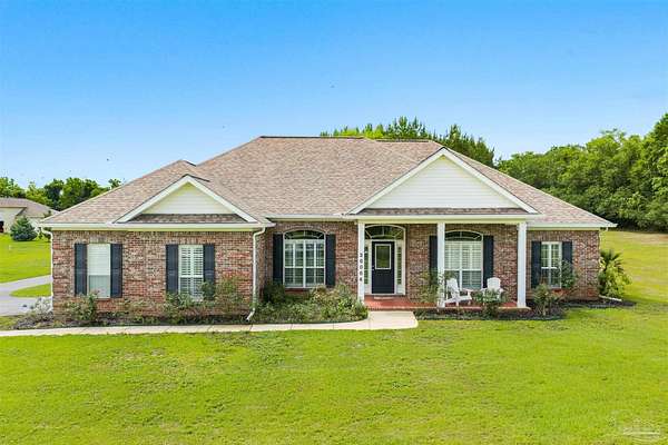4 Acres of Land with Home for Sale in Elberta, Alabama