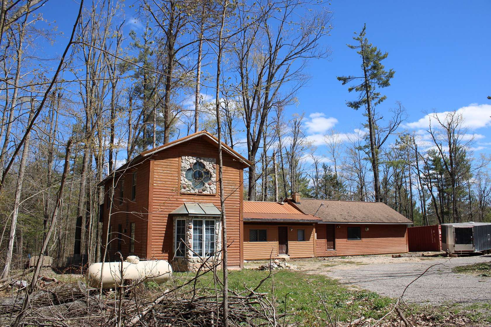 5 Acres of Land with Home for Sale in Comins, Michigan