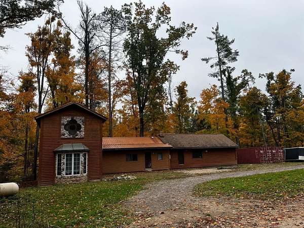 5 Acres of Land with Home for Sale in Comins, Michigan