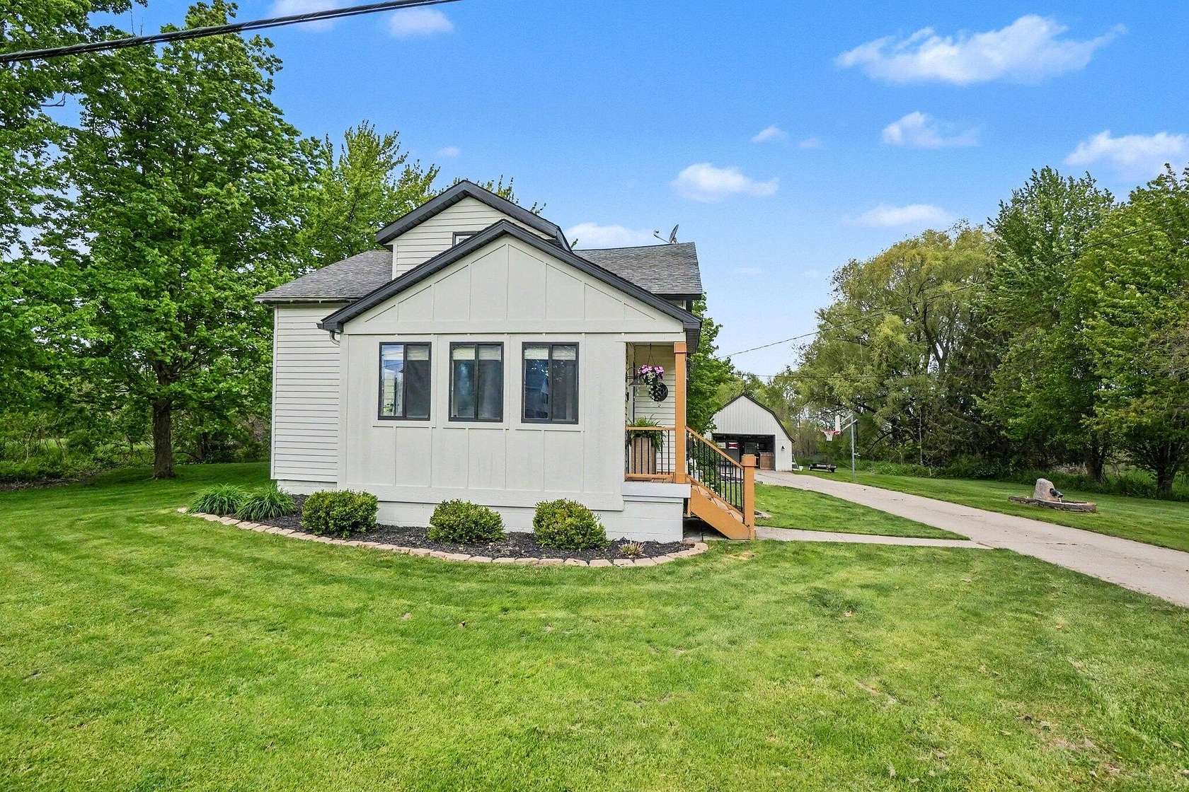 1.5 Acres of Land with Home for Sale in Hudsonville, Michigan
