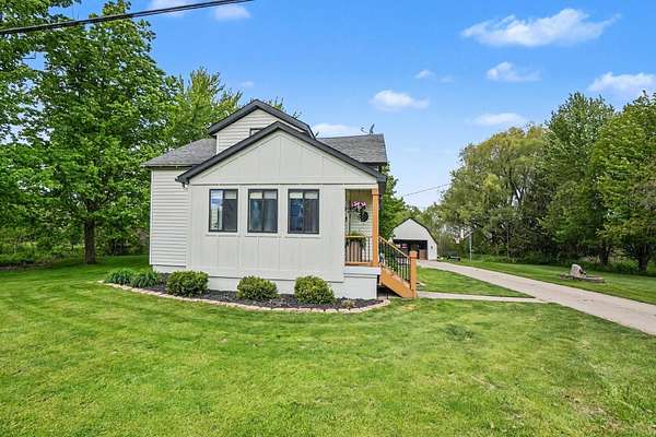 1.5 Acres of Land with Home for Sale in Hudsonville, Michigan