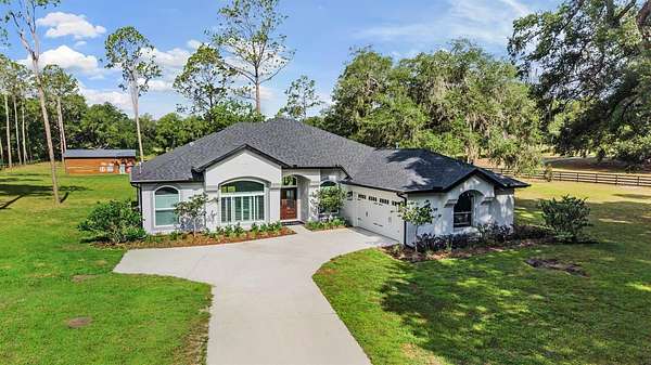 5.2 Acres of Land with Home for Sale in Dade City, Florida