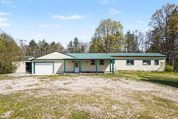 5.55 Acres of Land with Home for Sale in Luther, Michigan