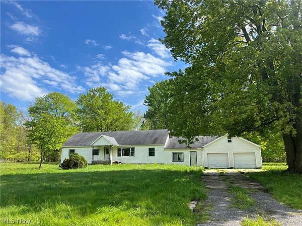 16.8 Acres of Land with Home for Sale in Madison, Ohio