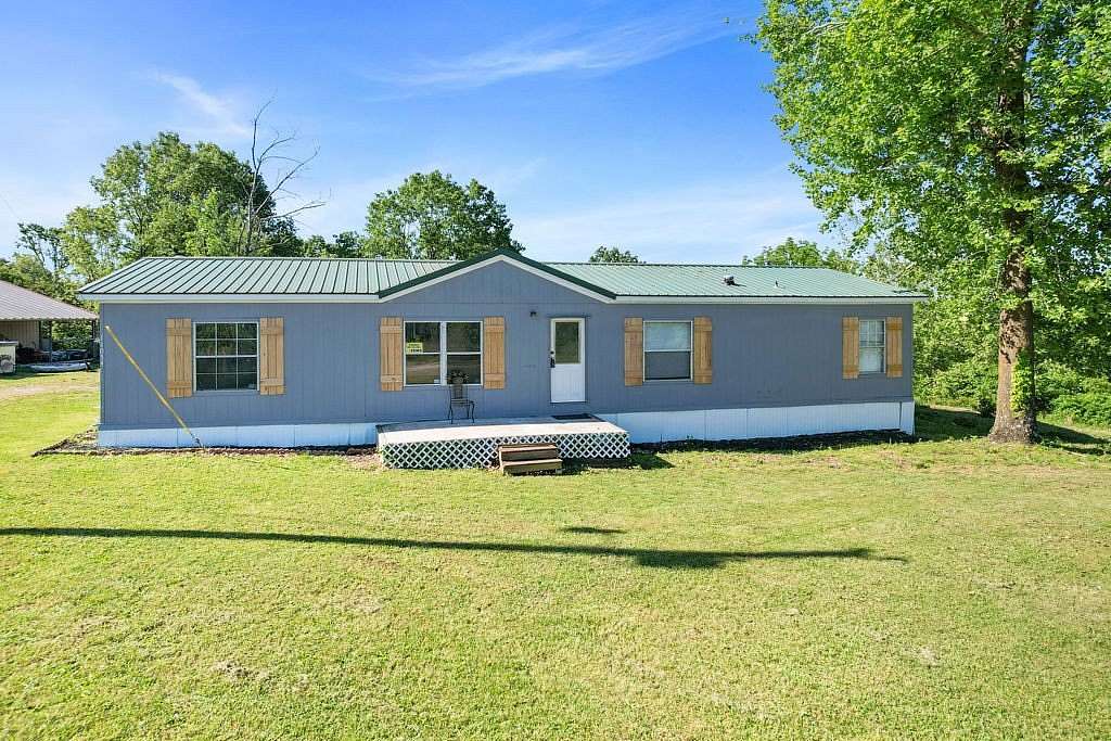 3.49 Acres of Land with Home for Sale in Lowell, Arkansas