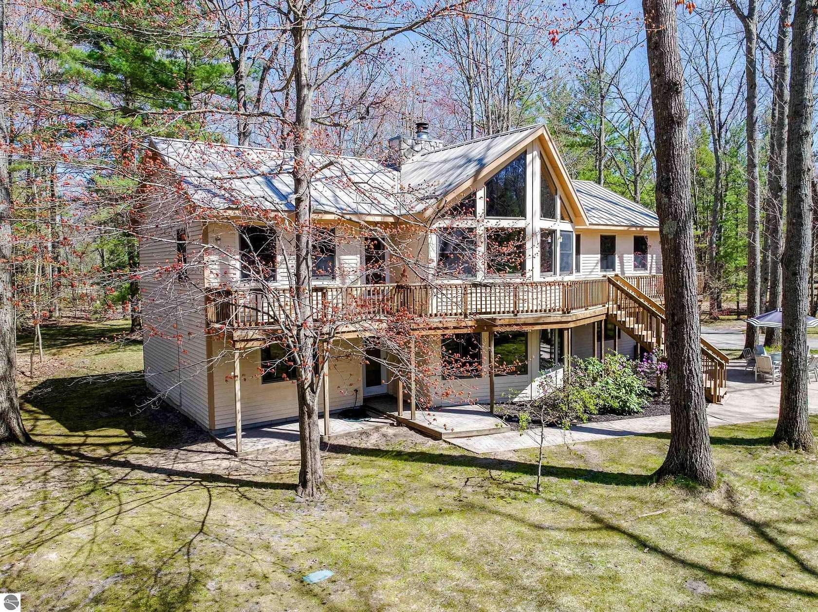 6 Acres of Land with Home for Sale in Interlochen, Michigan
