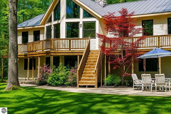 6 Acres of Land with Home for Sale in Interlochen, Michigan