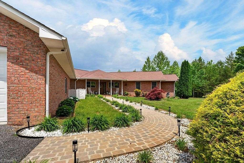 10 Acres of Land with Home for Sale in Pinnacle, North Carolina