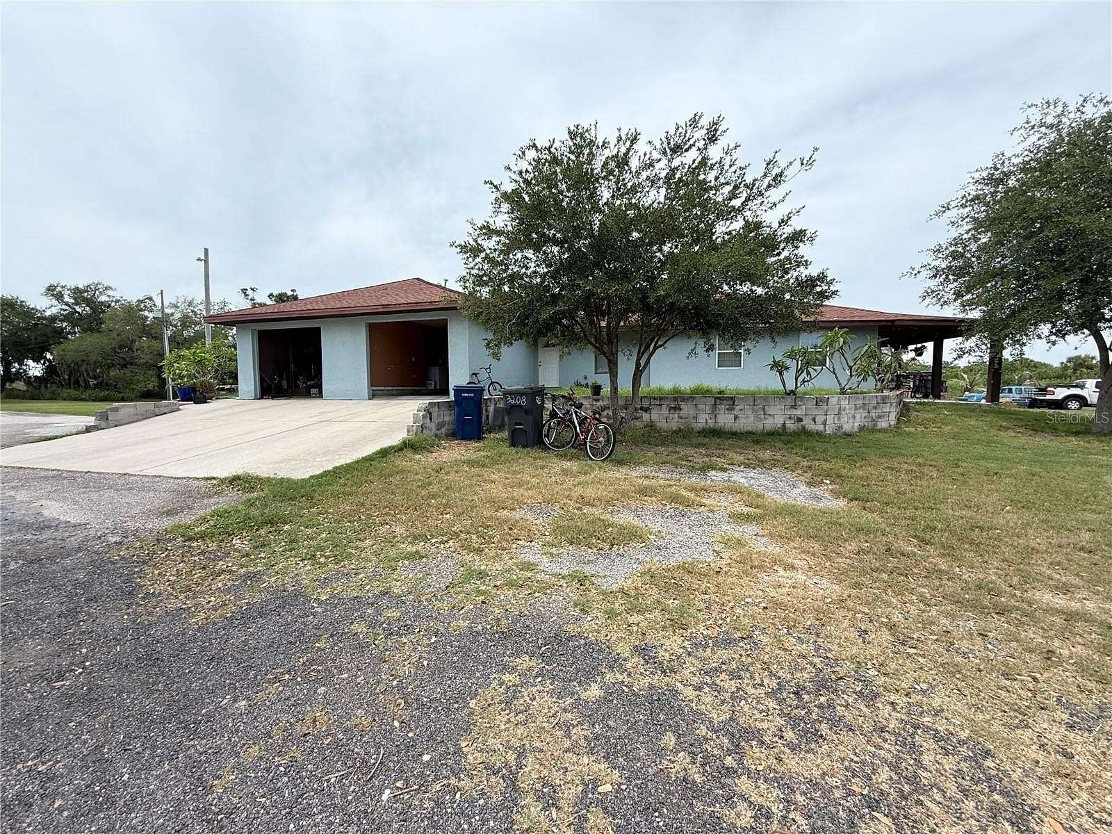 2.5 Acres of Land with Home for Sale in Palmetto, Florida