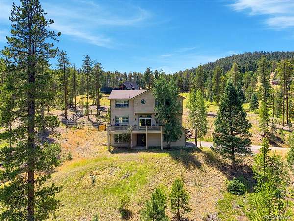 2.23 Acres of Land with Home for Sale in Evergreen, Colorado