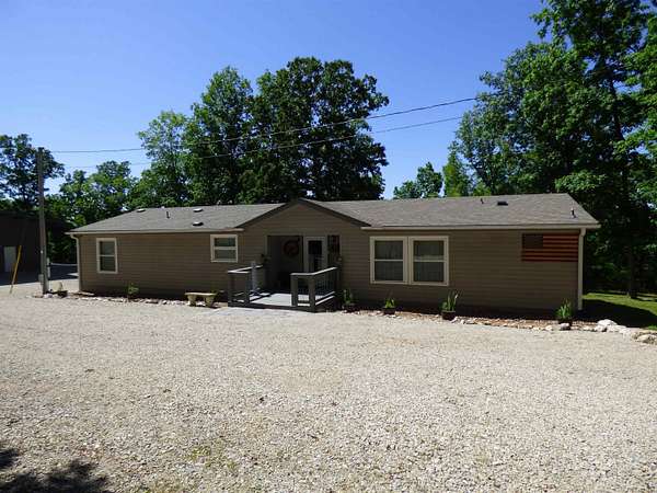 10 Acres of Land with Home for Sale in Hardy, Arkansas