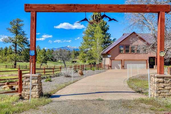 10 Acres of Land with Home for Sale in Pagosa Springs, Colorado