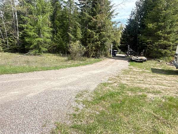 3 Acres of Land with Home for Sale in Bigfork, Montana