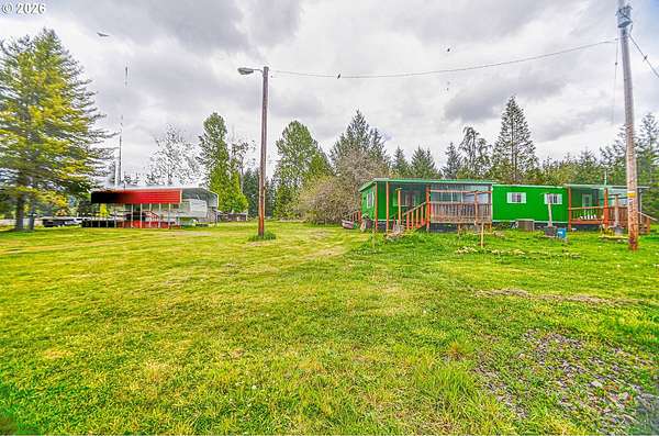 16.9 Acres of Land with Home for Sale in Rainier, Oregon