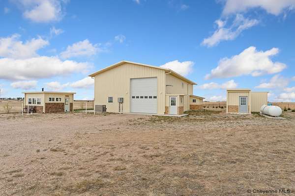 7.76 Acres of Land with Home for Sale in Burns, Wyoming