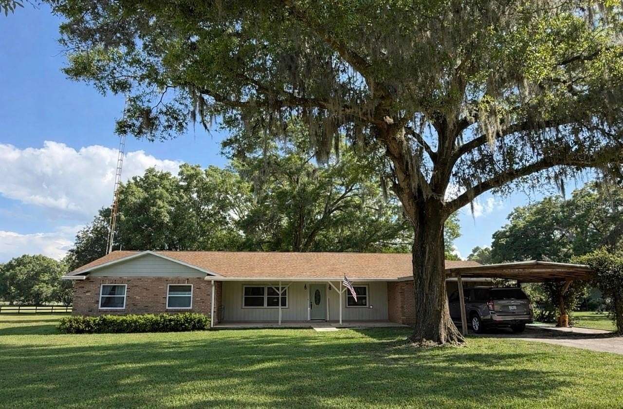 10.4 Acres of Land with Home for Sale in Citra, Florida