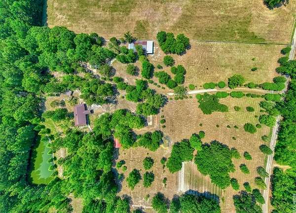 14.8 Acres of Land with Home for Sale in Brookeland, Texas