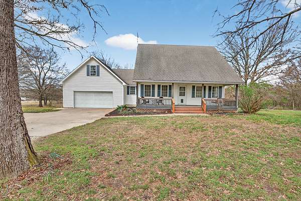 5.54 Acres of Land with Home for Sale in Humansville, Missouri