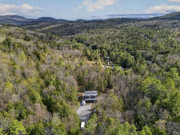 28.2 Acres of Recreational Land with Home for Sale in Sutton, New Hampshire