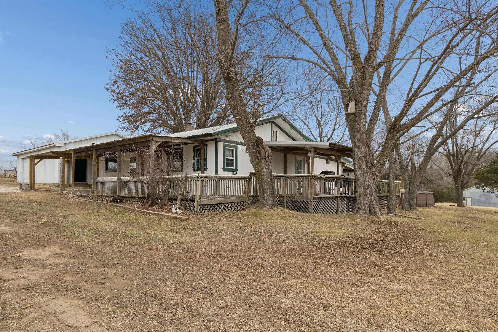 5 Acres of Land with Home for Sale in Humansville, Missouri