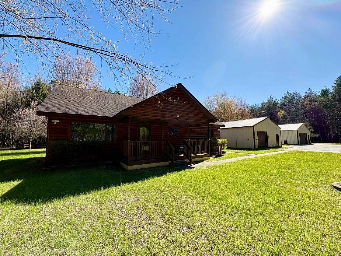 14.3 Acres of Recreational Land with Home for Sale in Lake City, Michigan