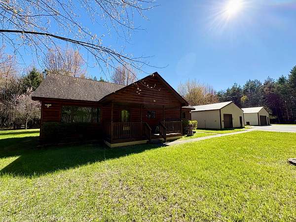 14.3 Acres of Recreational Land with Home for Sale in Lake City, Michigan