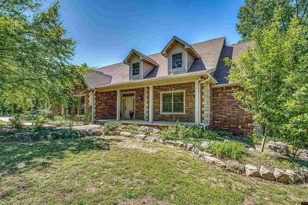 40.2 Acres of Land with Home for Sale in Viola, Arkansas