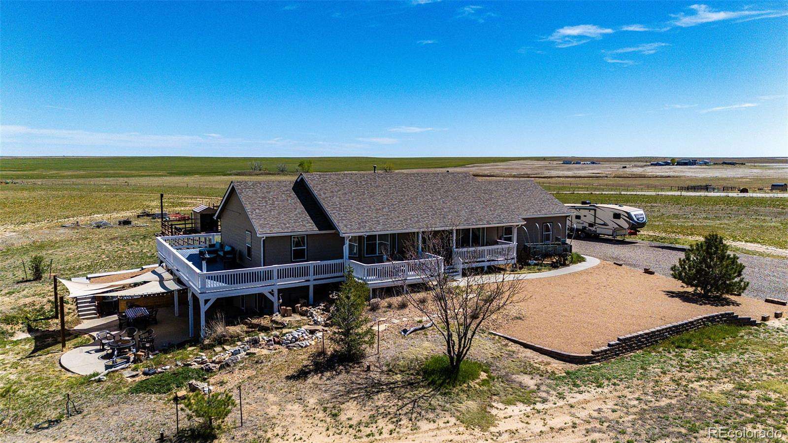 35 Acres of Agricultural Land with Home for Sale in Strasburg, Colorado