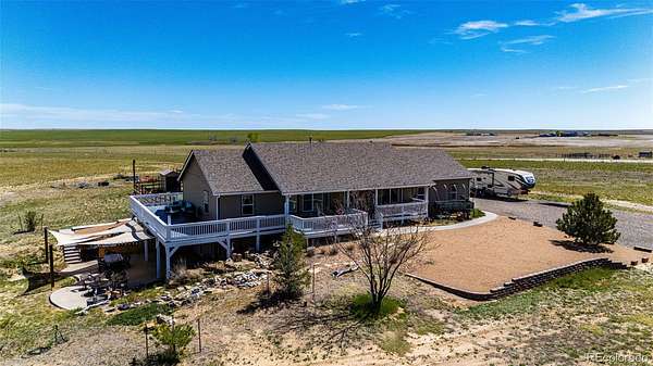 35 Acres of Agricultural Land with Home for Sale in Strasburg, Colorado