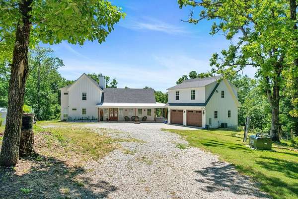 22.4 Acres of Land with Home for Sale in Rogers, Arkansas